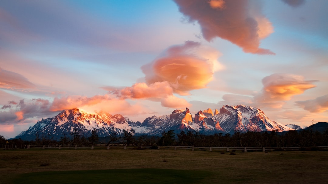 gray mountain under white clouds,