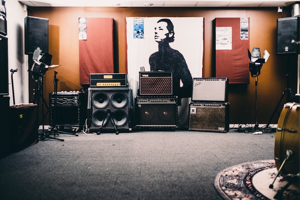 black PA speakers inside room