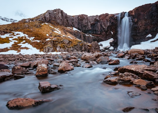 timelapse photo of waterfalls during daytime in Northeastern Region Iceland