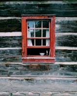 red wooden window frame
