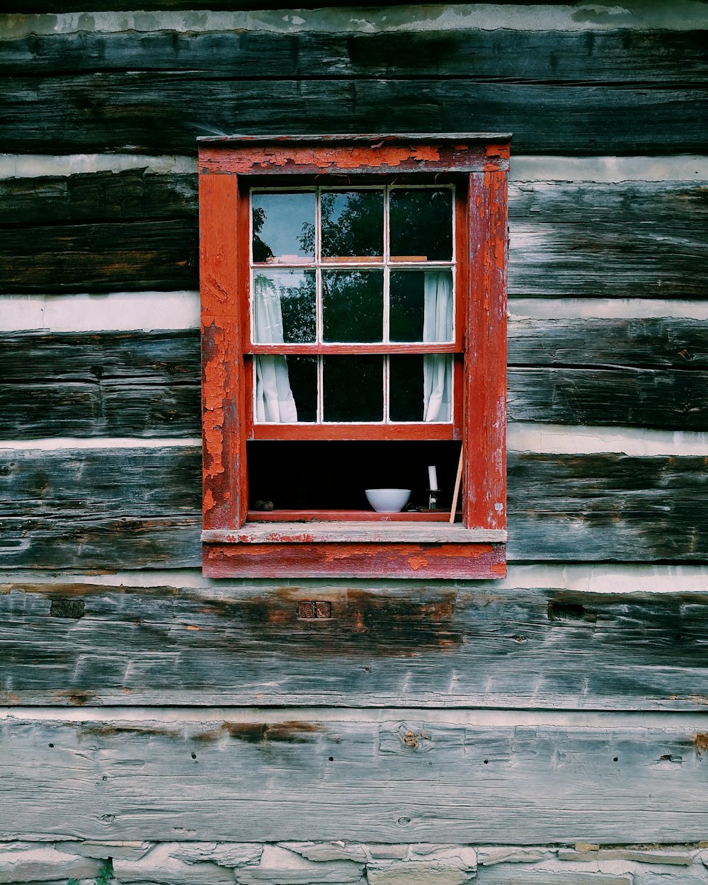 red wooden window frame