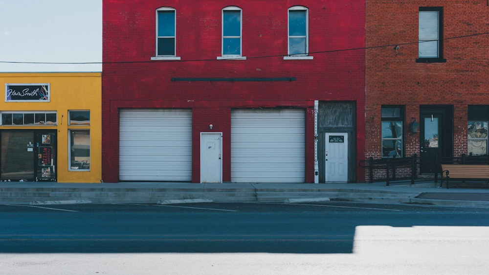 white garage doors closed during daytime