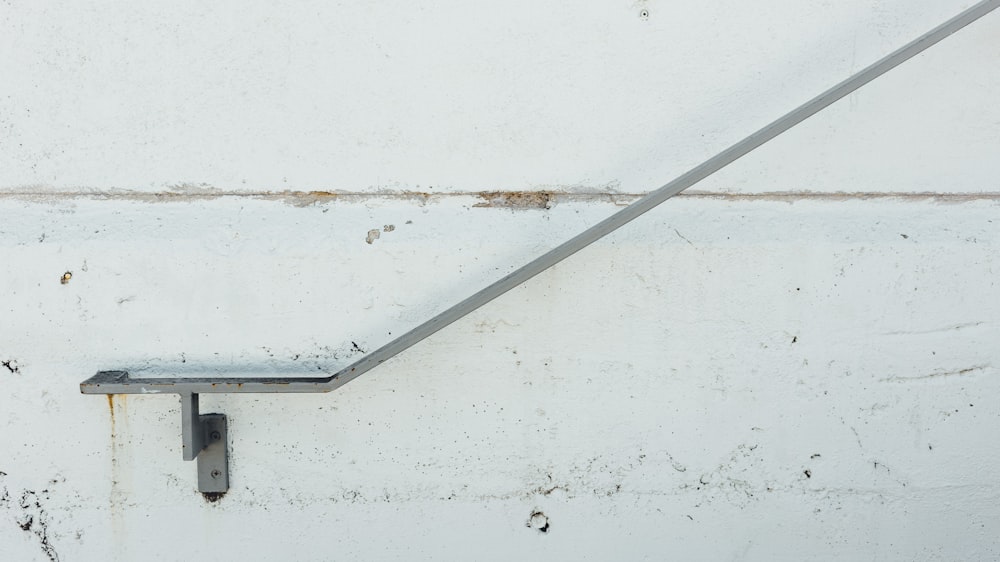 a close up of a metal object on a wall