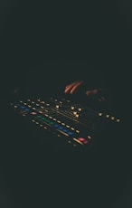 a close up of a person typing on a keyboard