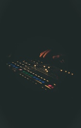 a close up of a person typing on a keyboard