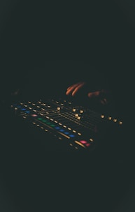 a close up of a person typing on a keyboard
