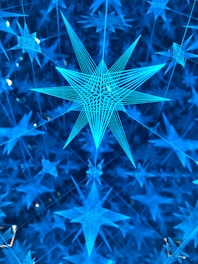 A delicate golden constellation pattern overlaying a dark blue background, symbolizing interconnected content.