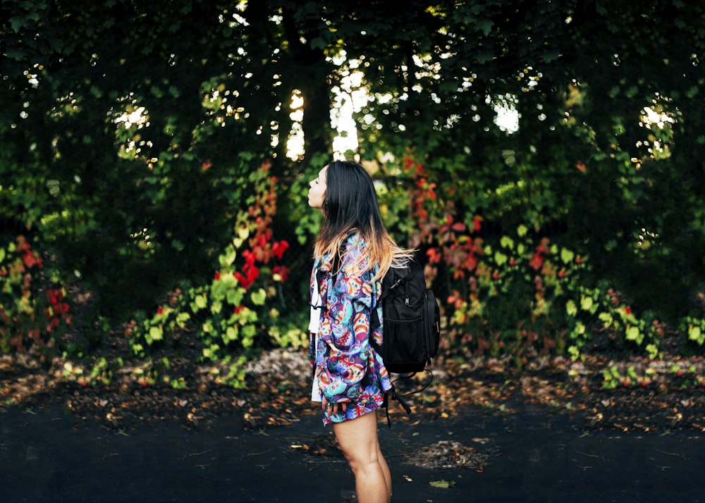 woman standing looking up