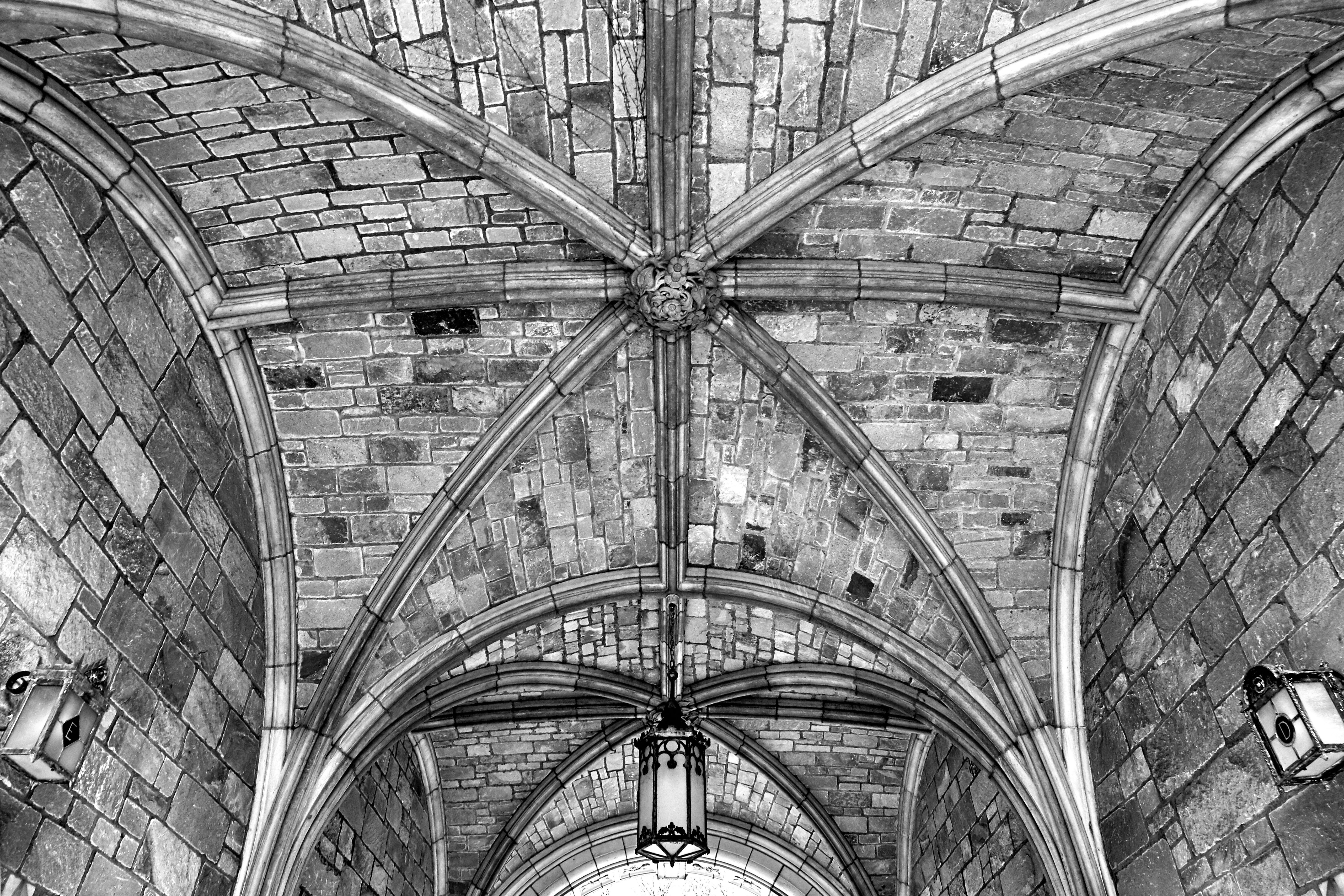 grayscale photography of concrete ceiling