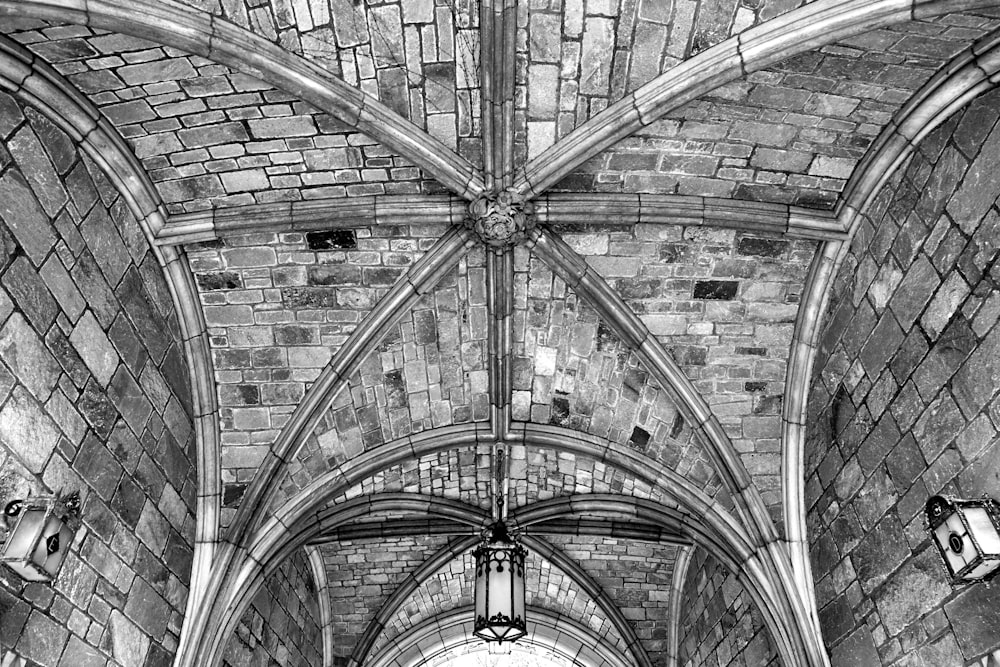 grayscale photography of concrete ceiling