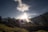 A serene landscape featuring mountains and a sunrise, symbolizing spiritual awakening and connection to nature.