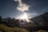 A serene landscape featuring mountains and a sunrise, symbolizing spiritual awakening and connection to nature.