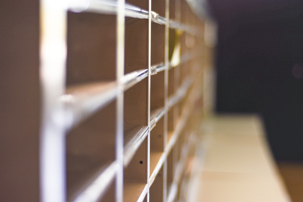 selective-focus photography of beige shelf