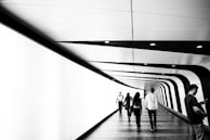 Participants walking through the Terowongan Silaturahim connecting Istiqlal and Katedral, reflecting on history.