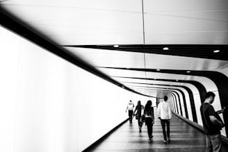 Participants walking through the Terowongan Silaturahim connecting Istiqlal and Katedral, reflecting on history.