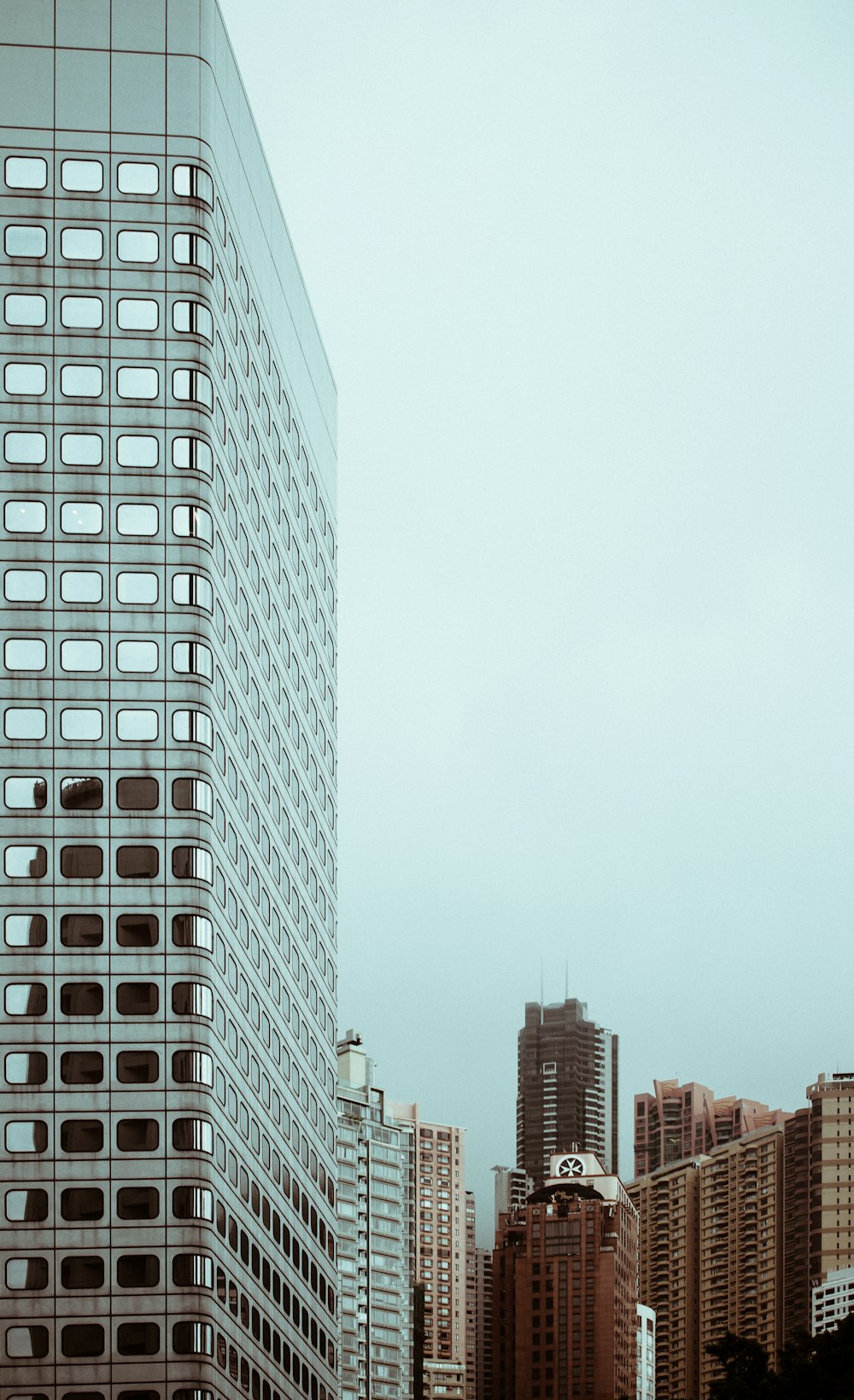 photo of concrete city buildings