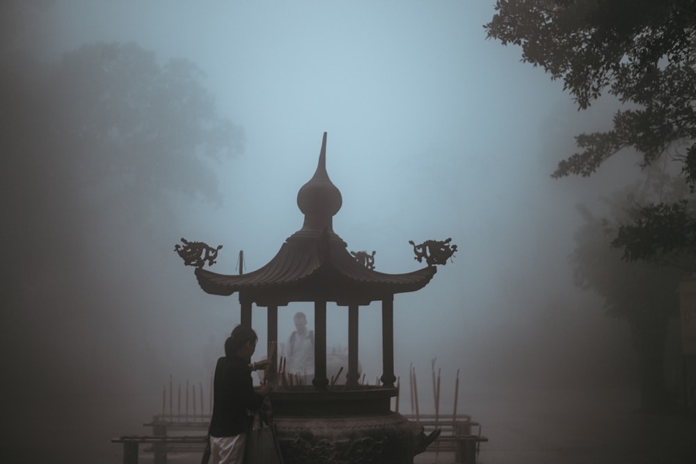 woman standing near altar