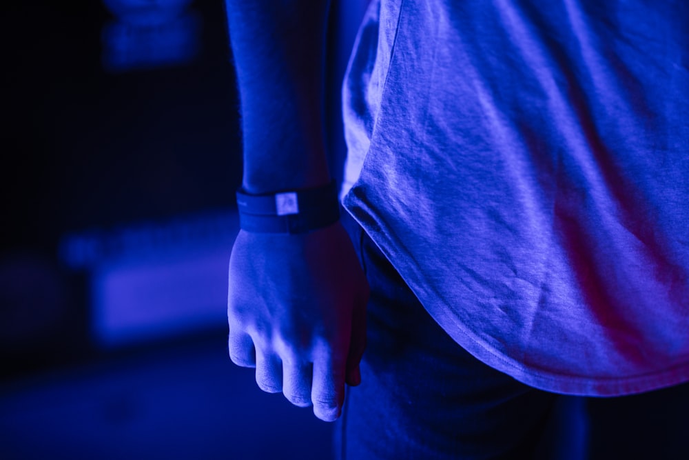 person wearing silicone band
