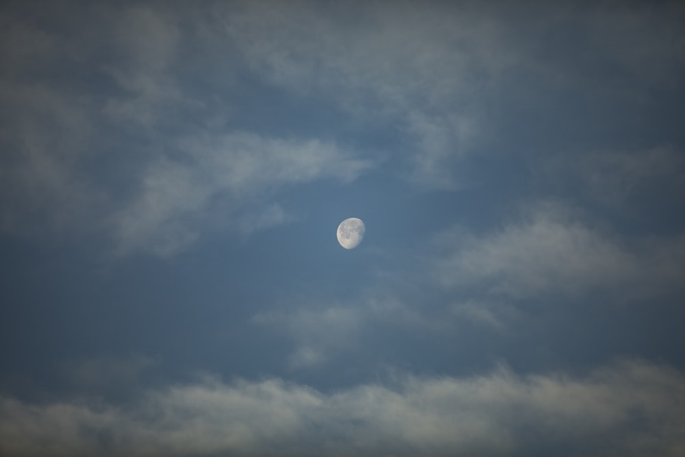 moon on white and blue sky