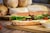 baked bread with vegetable on brown chopping board