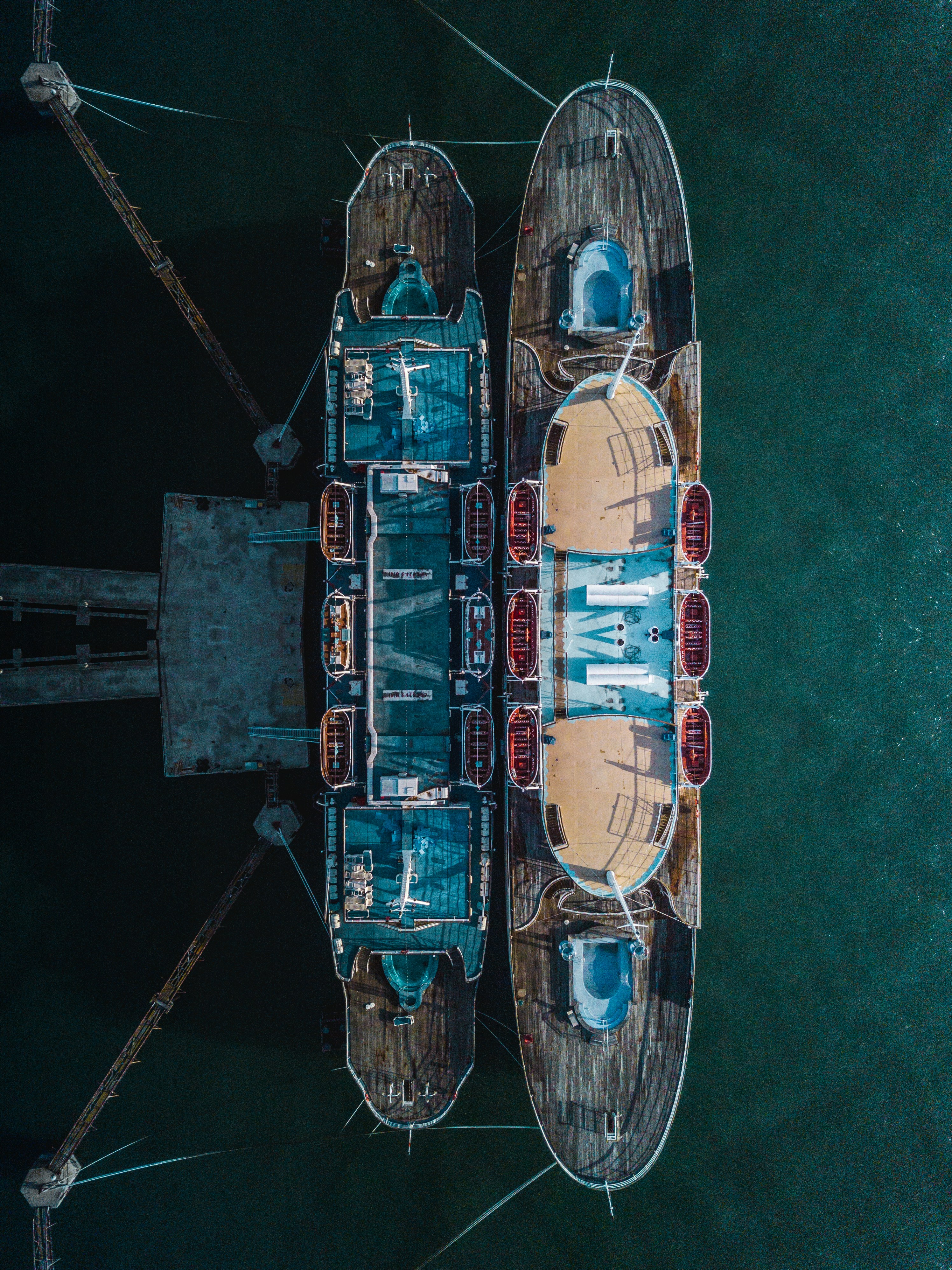 two brown-and-blue boat dock in aerial photography