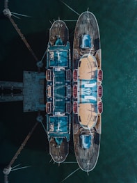 two brown-and-blue boat dock in aerial photography
