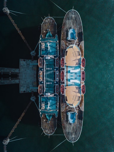 two brown-and-blue boat dock in aerial photography