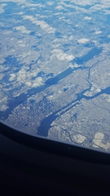 Aerial view of a bustling city with overlaid mapping data.