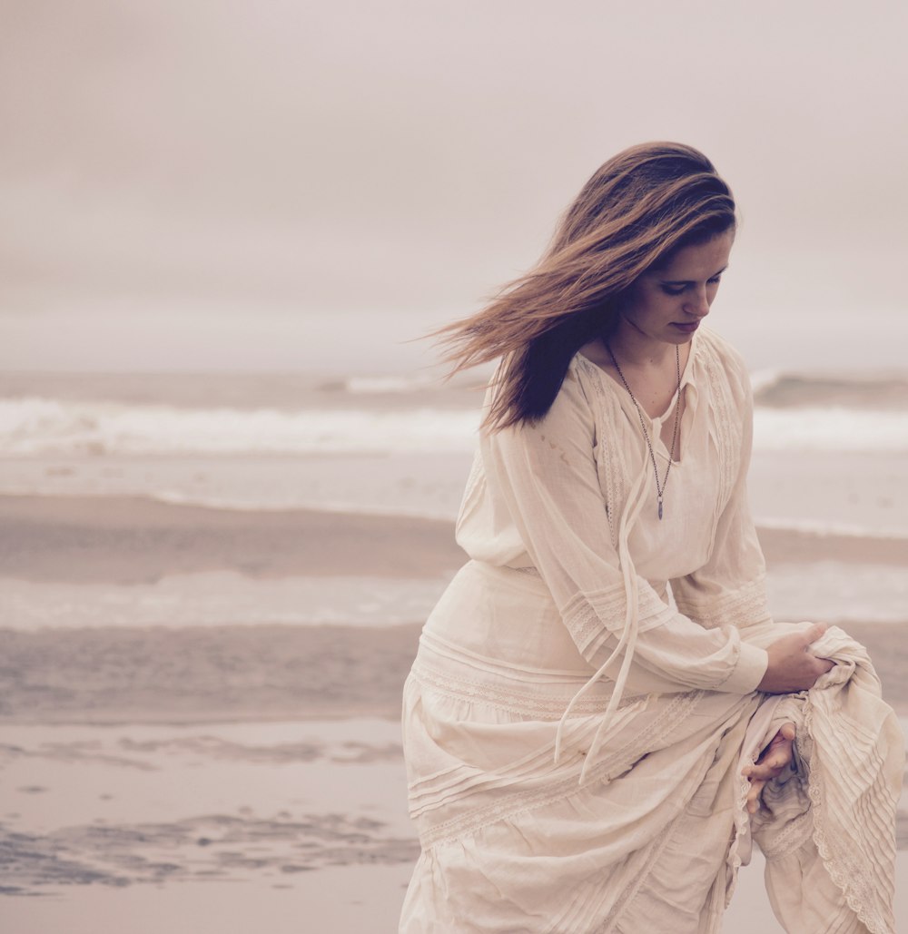 woman standing on the seashore