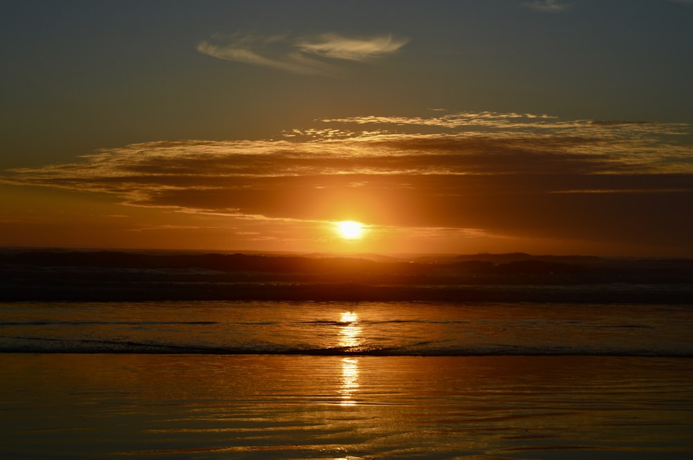 landscape photography of ocean during golden hour
