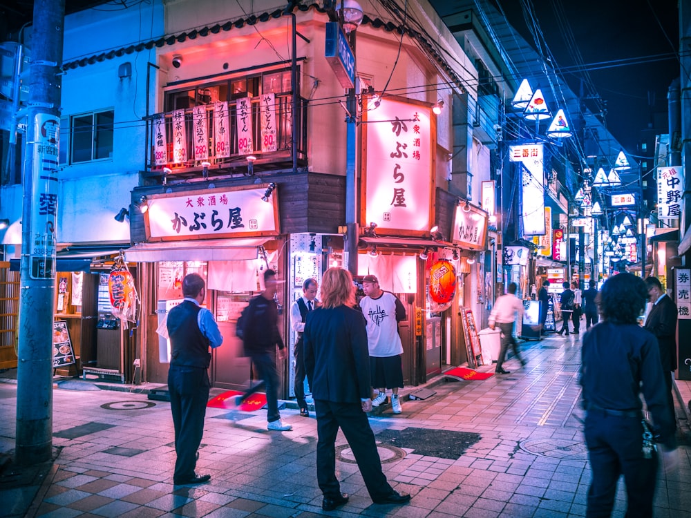 people standing beside store