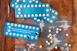 four blue blister packs