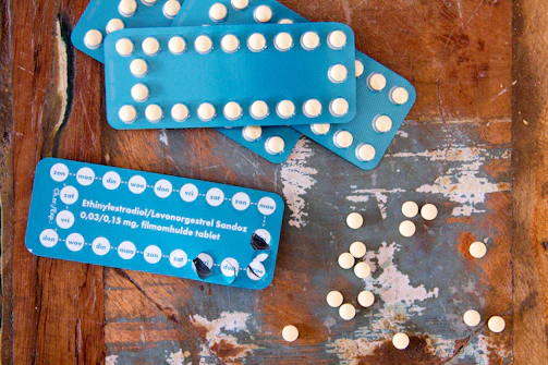 four blue blister packs