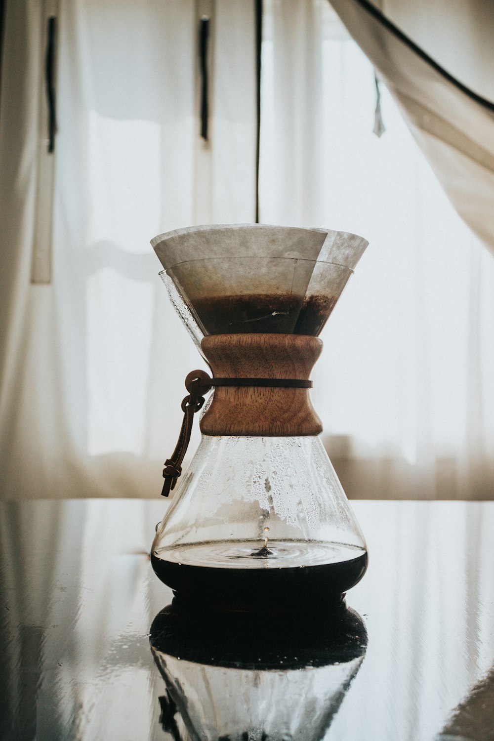 a coffee pot sitting on top of a table