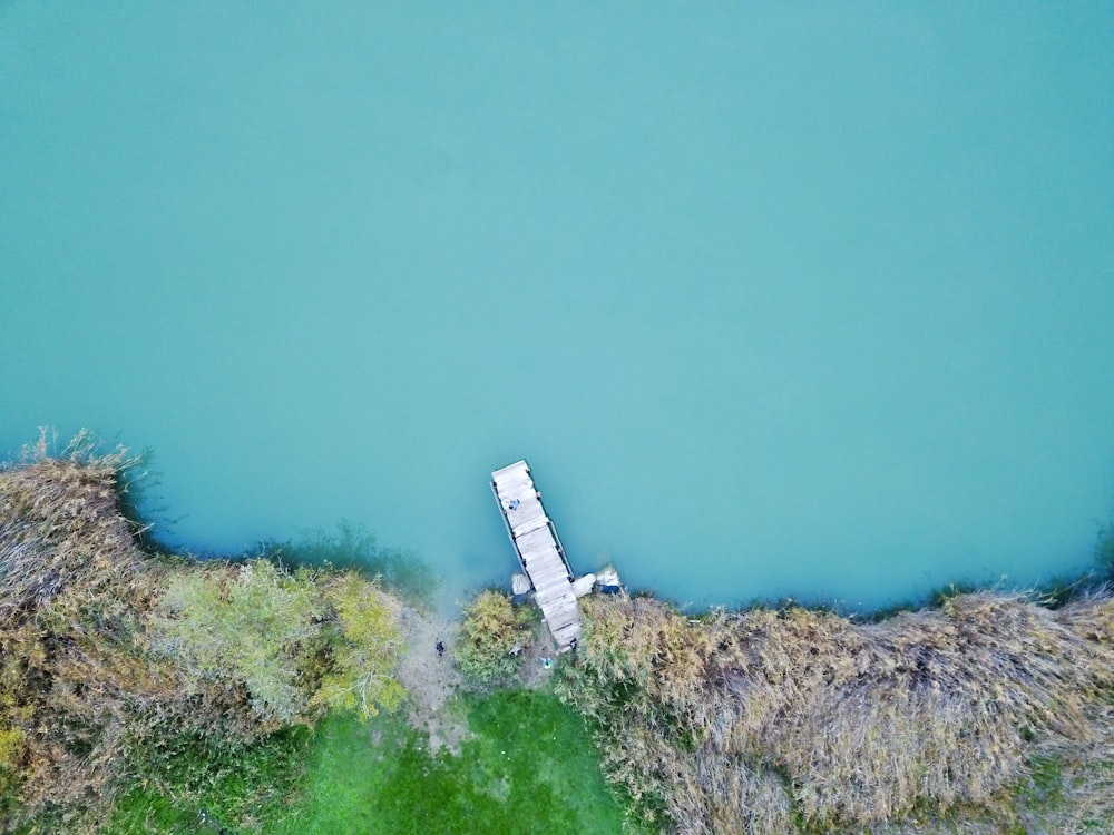 aerial photography of white wooden dock