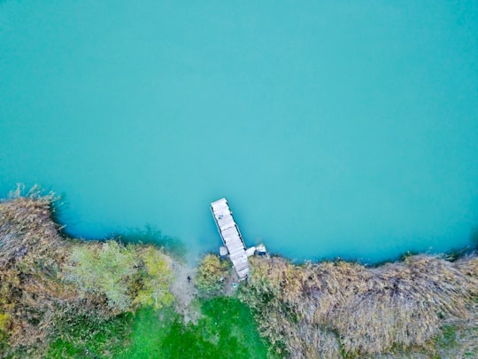 aerial photography of white wooden dock in Calci Italy