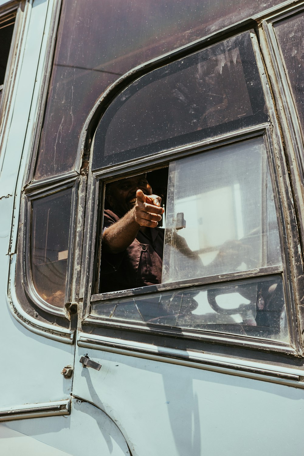 man riding bus