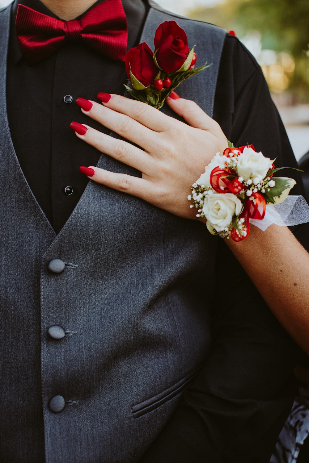 man in gray formal vest