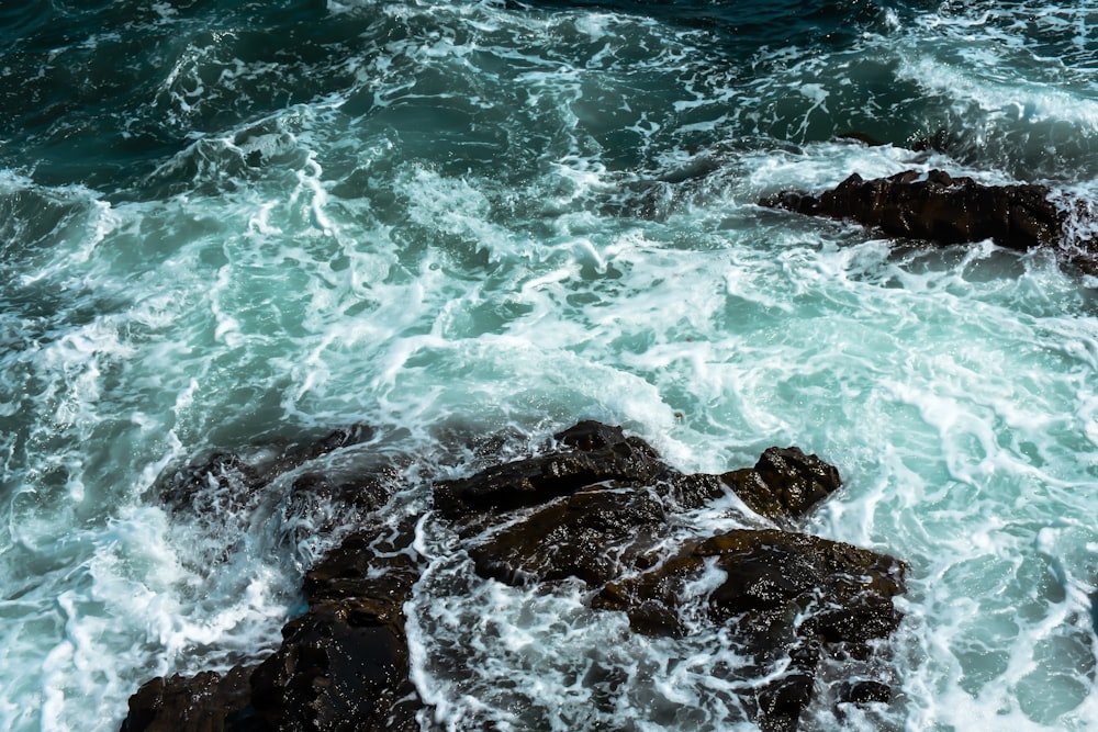 rocks on body of water