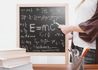 E-mc2 written on chalkboard