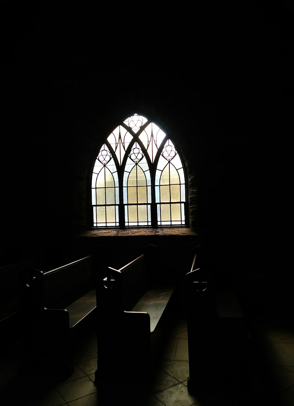 closeup photo of brown wooden pews