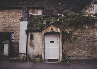 landscape photo of closed white door