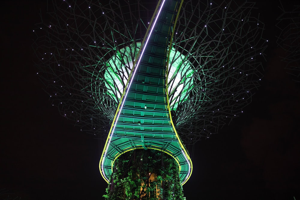 low-angle shot of green tower