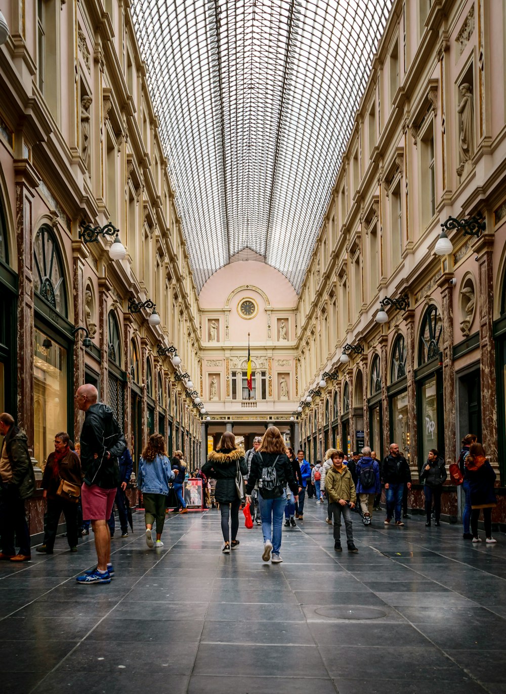 busy people walking on hallway