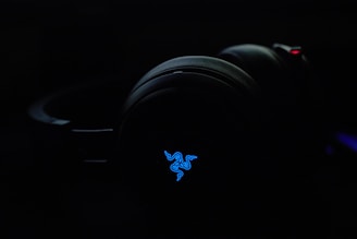 A stylish pair of headphones highlighted with a glowing sale icon.