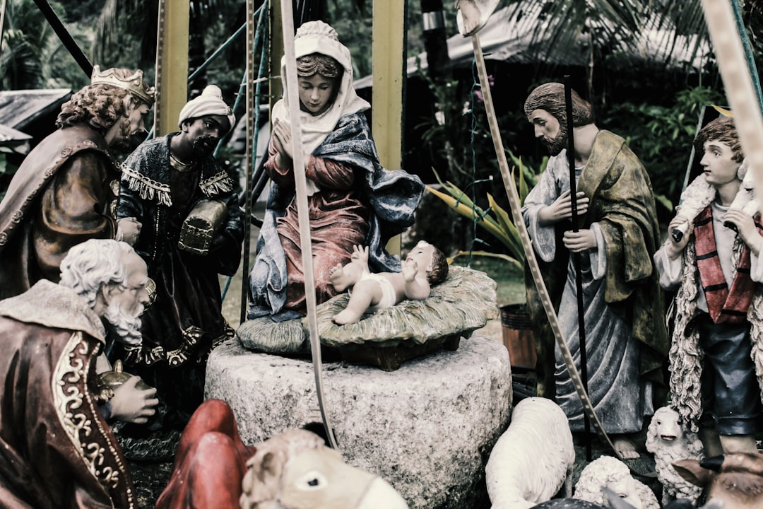 a nativity scene with figurines of people and animals, A new born king