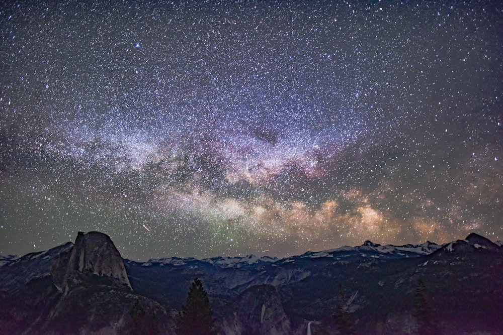 mountain under starry sky