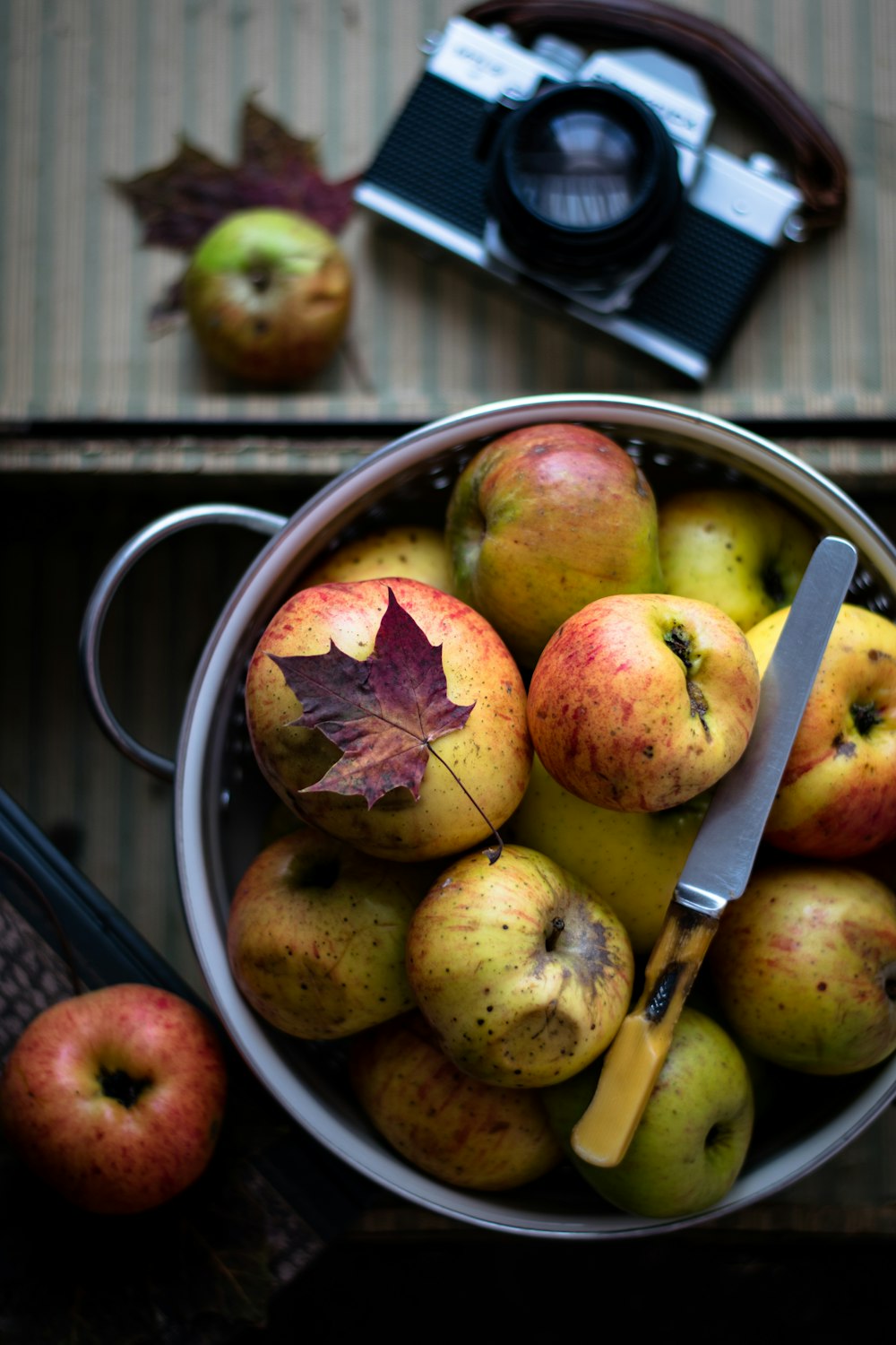 flat lay photography of pot of apples