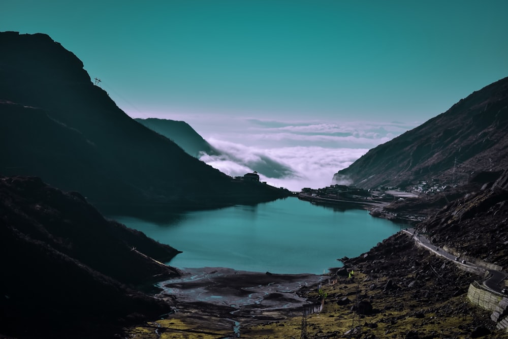 aerial view of mountain and body of water