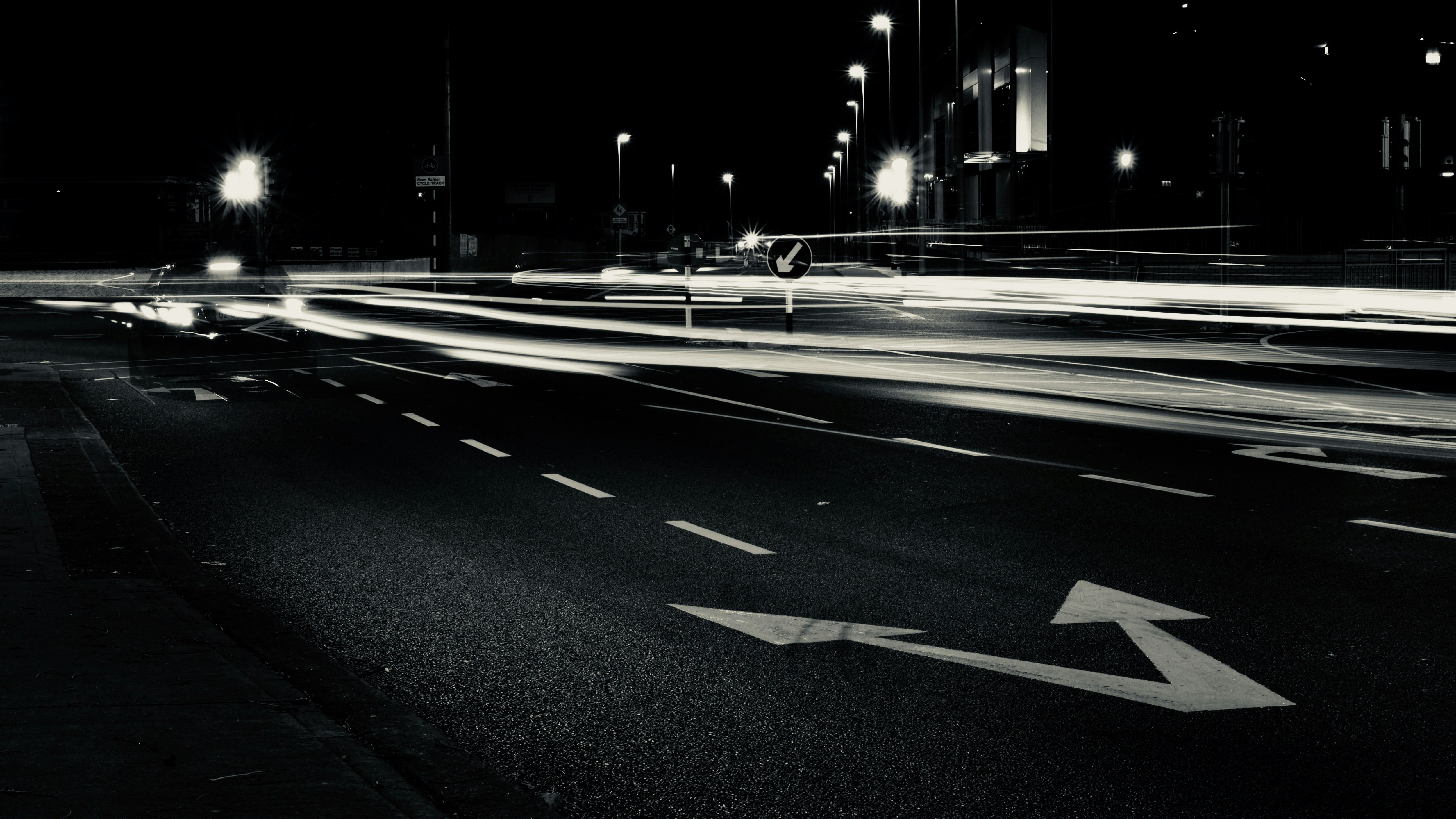 timelapse photography of cars on road dublin teams background